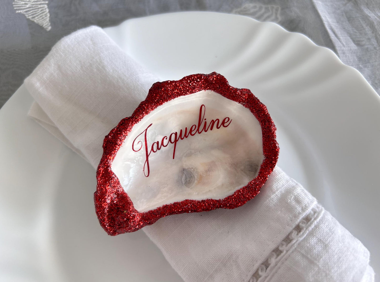 Personalised Red Glitter Oyster Shell Place Settings.