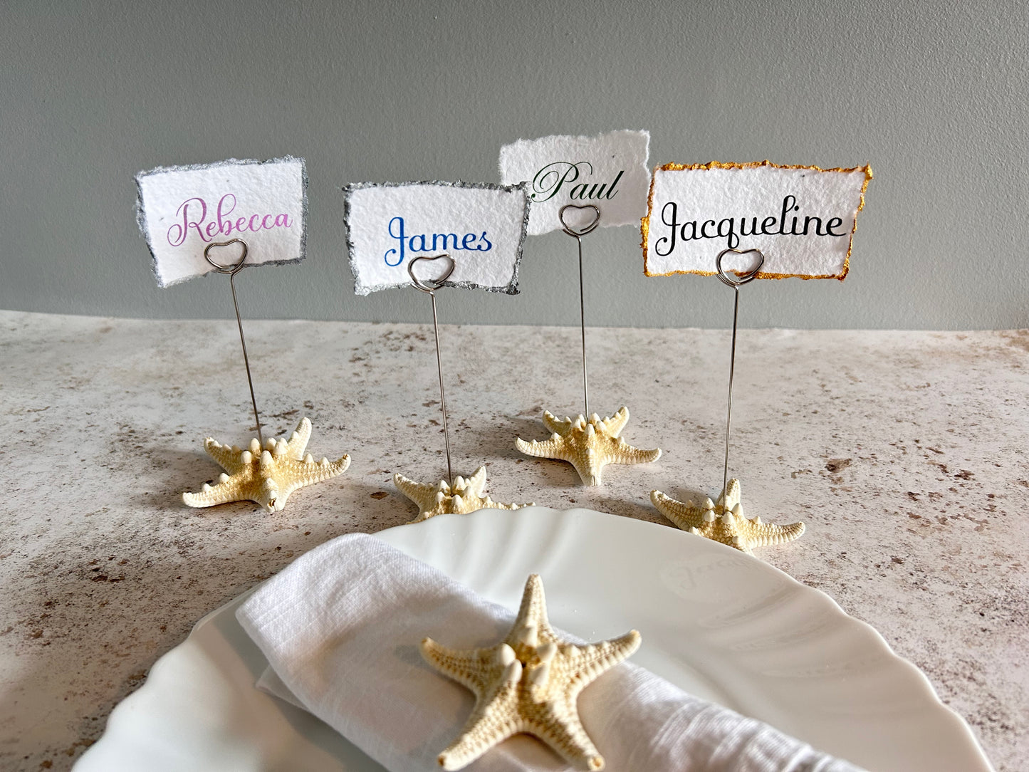 Natural starfish gold place name holder. Optional seeded card place name.