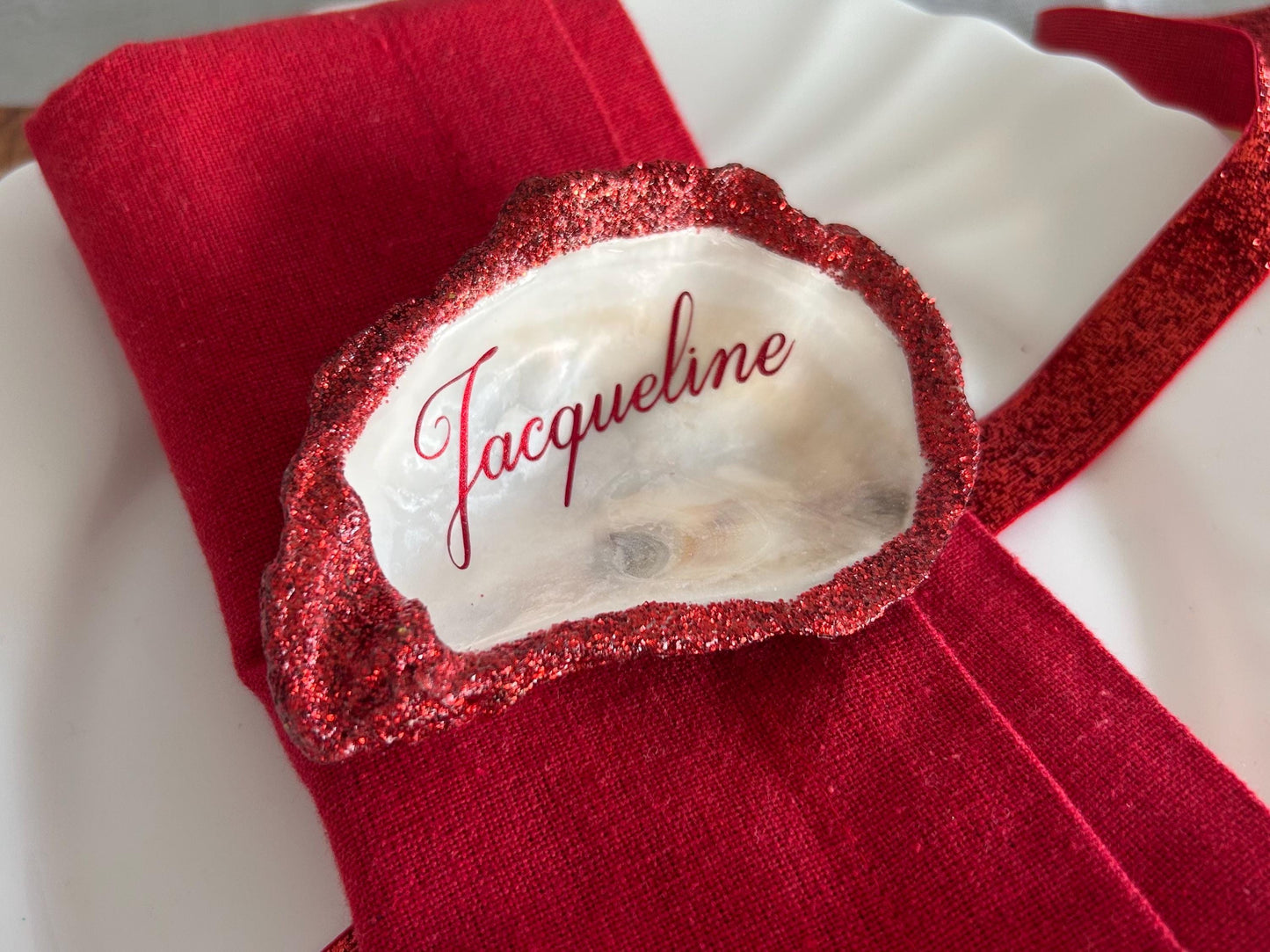 Personalised Red Glitter Oyster Shell Place Settings.