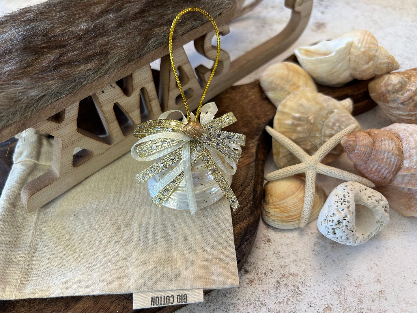 Mother of Pearl Pearlescent Trochus Spiral Shell Hanging Decoration.