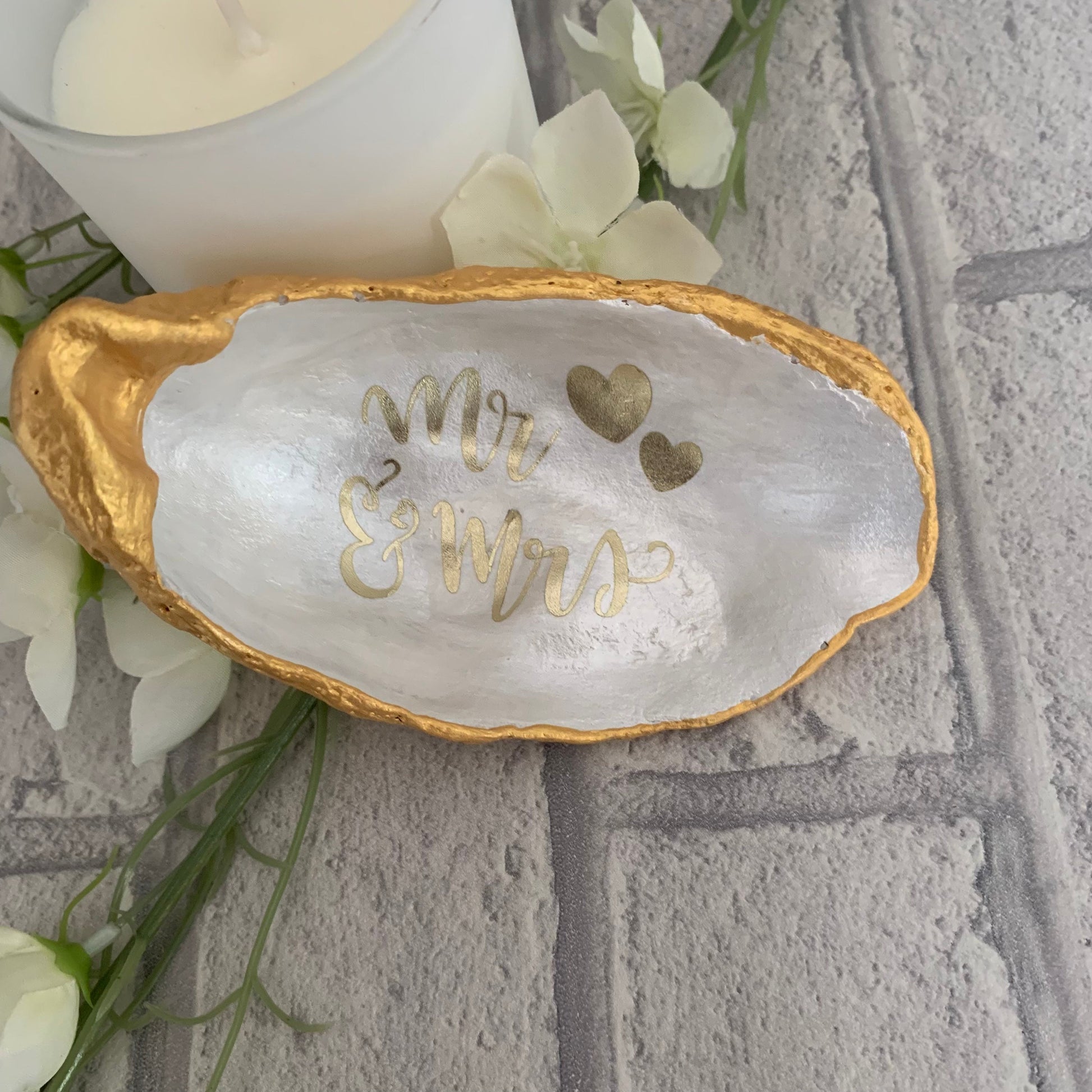 Mr and Mrs gold oyster shell ring dish.