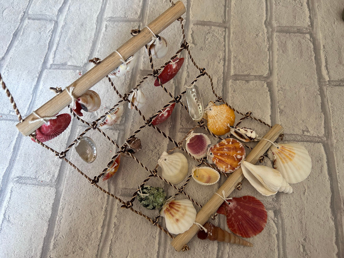 Sea Shell Net Ladder Hanging Decor: Coastal Wall Art for Home or Garden.