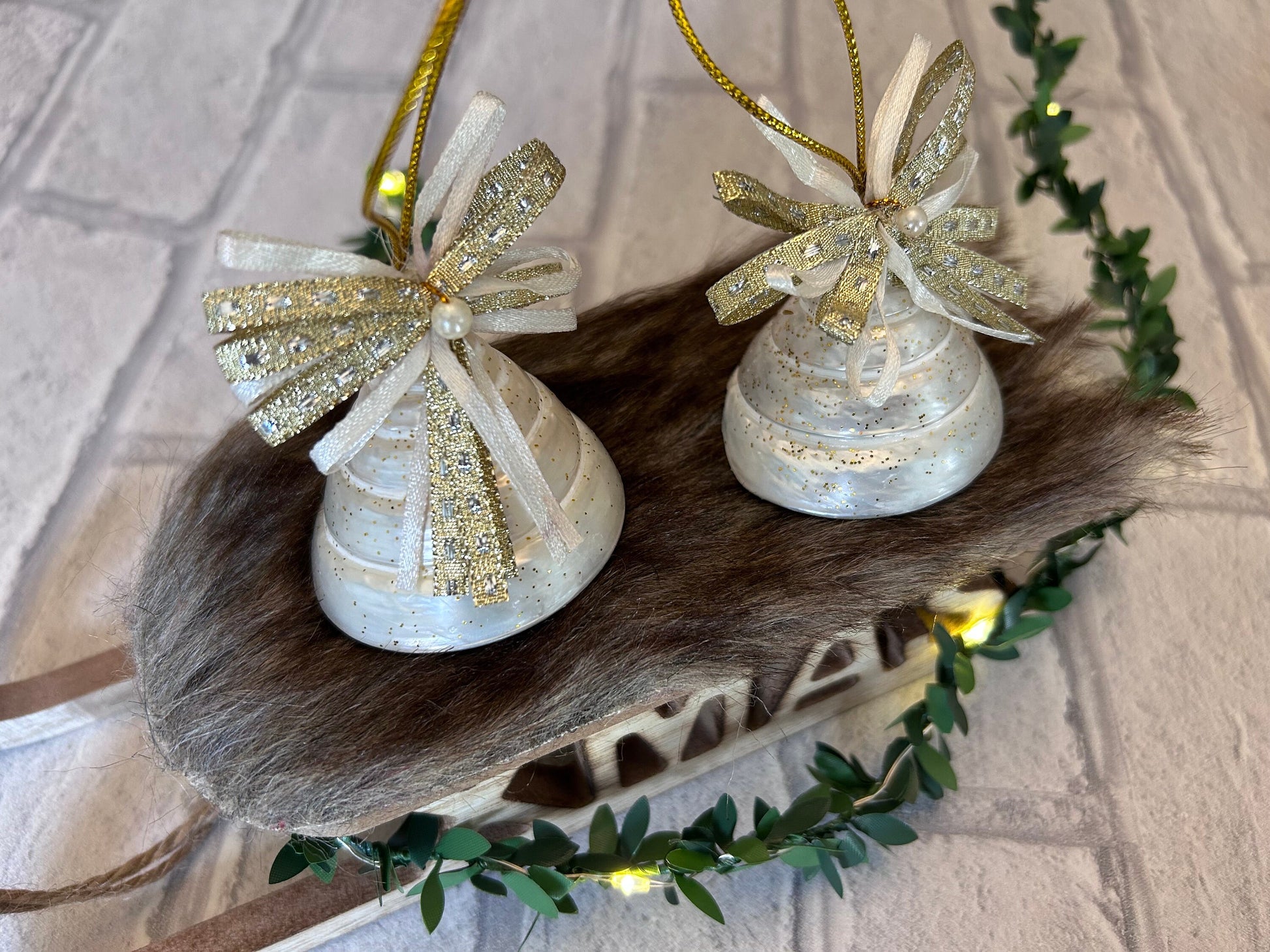 Pearlescent shell hanging decoration. Natural Trochus spiral shell bauble. Mother of Pearl and gold glitter door decor. Fisherman aesthetic