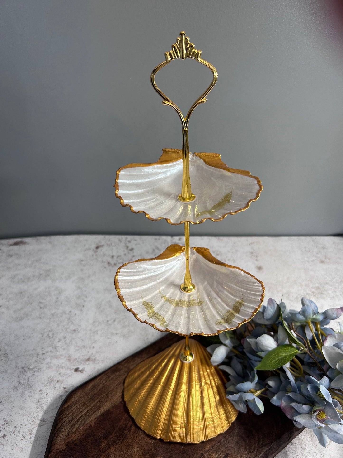 Gold scallop shell jewellery stand with feather design. Two tier jewellery display gift for her. Bedside ring, earring and necklace holder.
