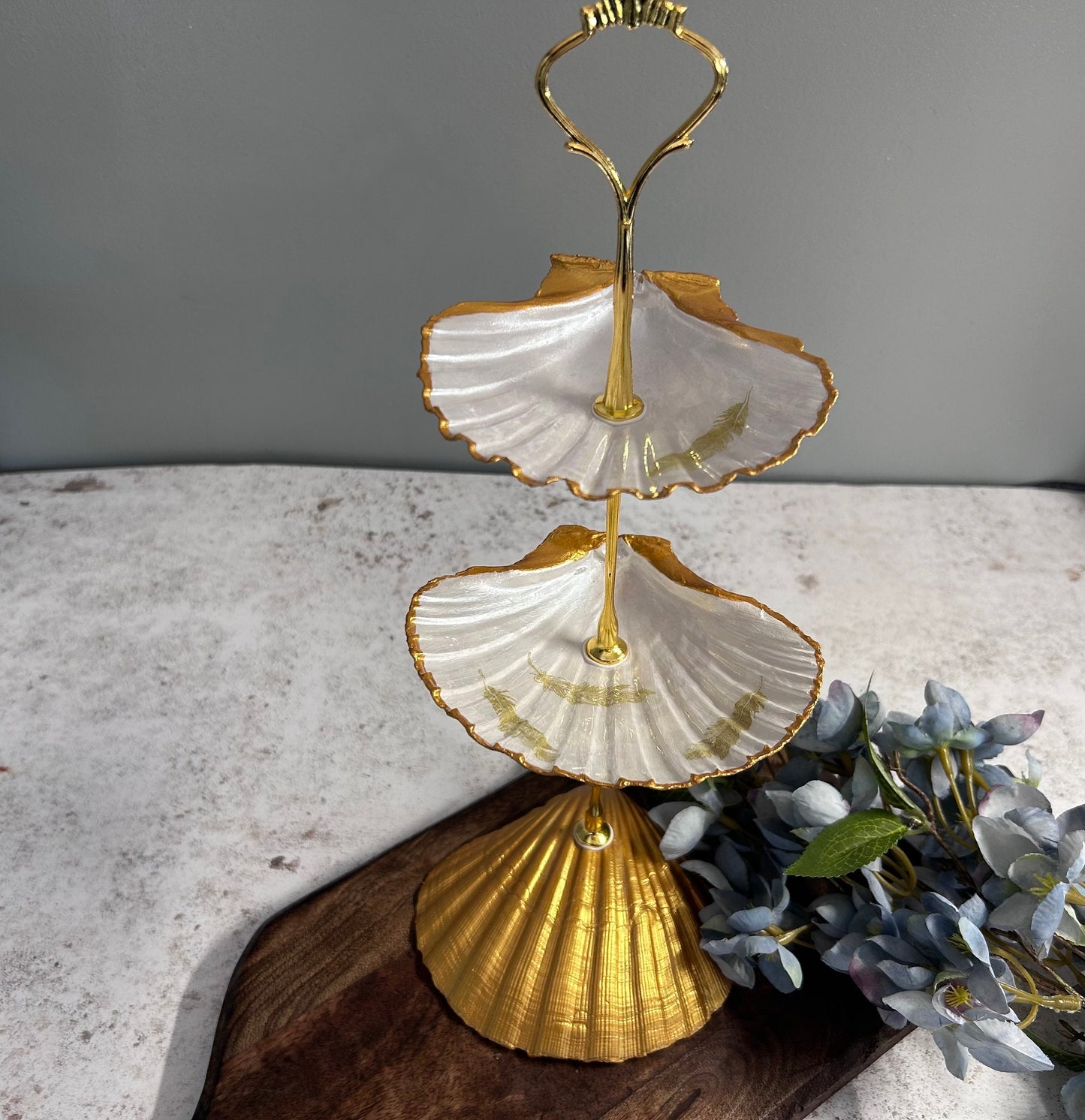Gold scallop shell jewellery stand with feather design. Two tier jewellery display gift for her. Bedside ring, earring and necklace holder.