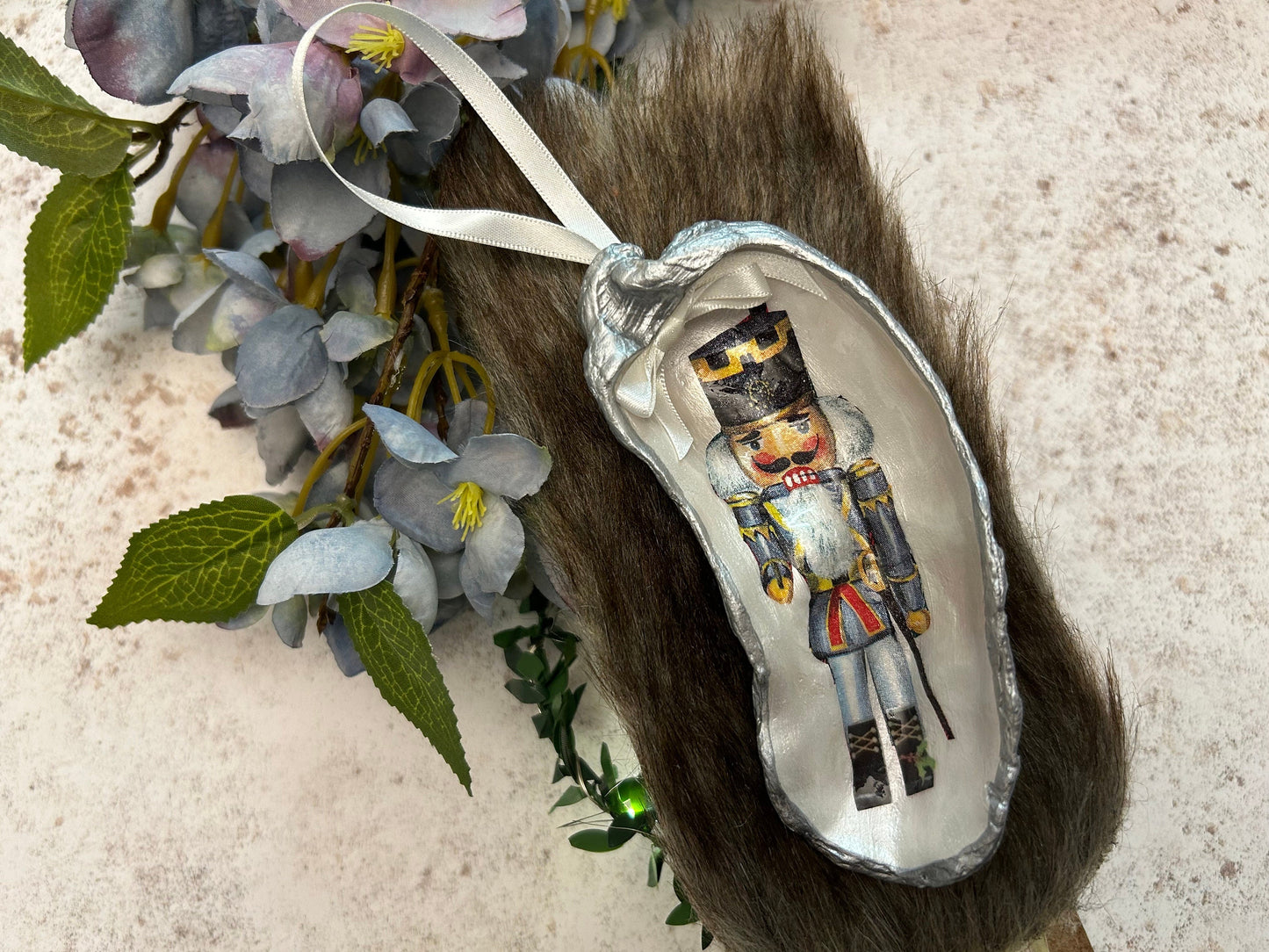 Nutcracker Christmas Tree Ornament. Silver Oyster Shell Holiday Decoration.