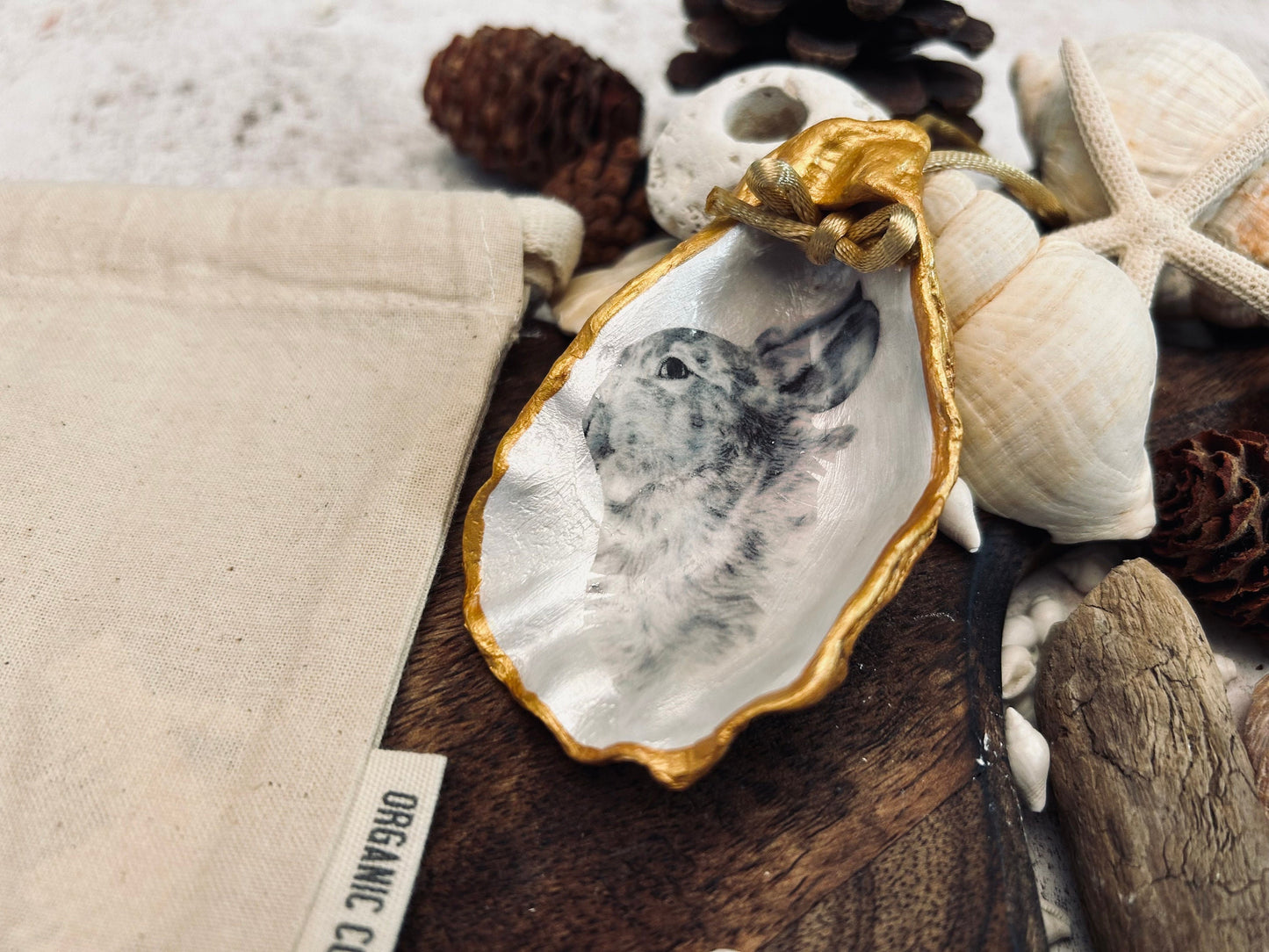 Hare portrait oyster shell in rich gold. Easter gift for hare lovers. Black and gold hare hanging ornament. Wildlife animal gift.