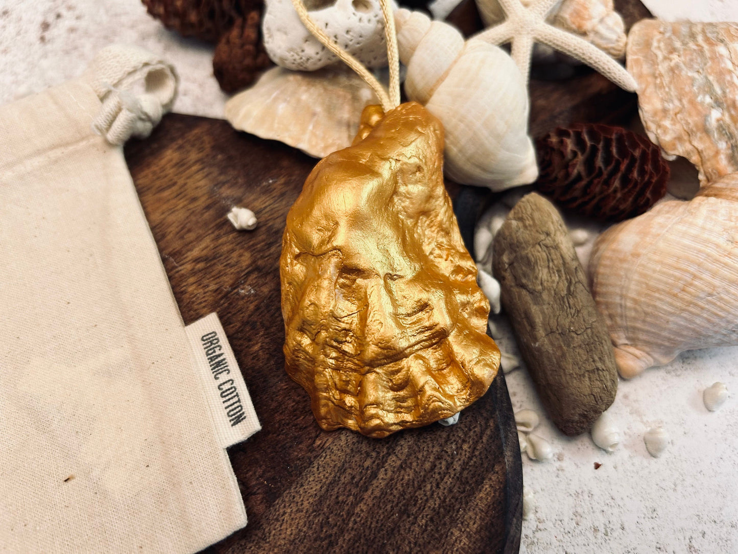 Hare portrait oyster shell in rich gold. Easter gift for hare lovers. Black and gold hare hanging ornament. Wildlife animal gift.