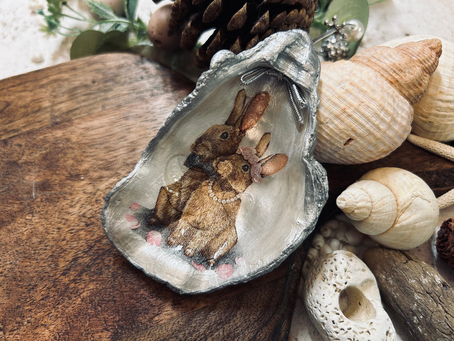 Brown Bunnies hanging decoration. Natural oyster shell rabbit gift for a nature lover. Easter spring table decor. Rabbit lovers gift.