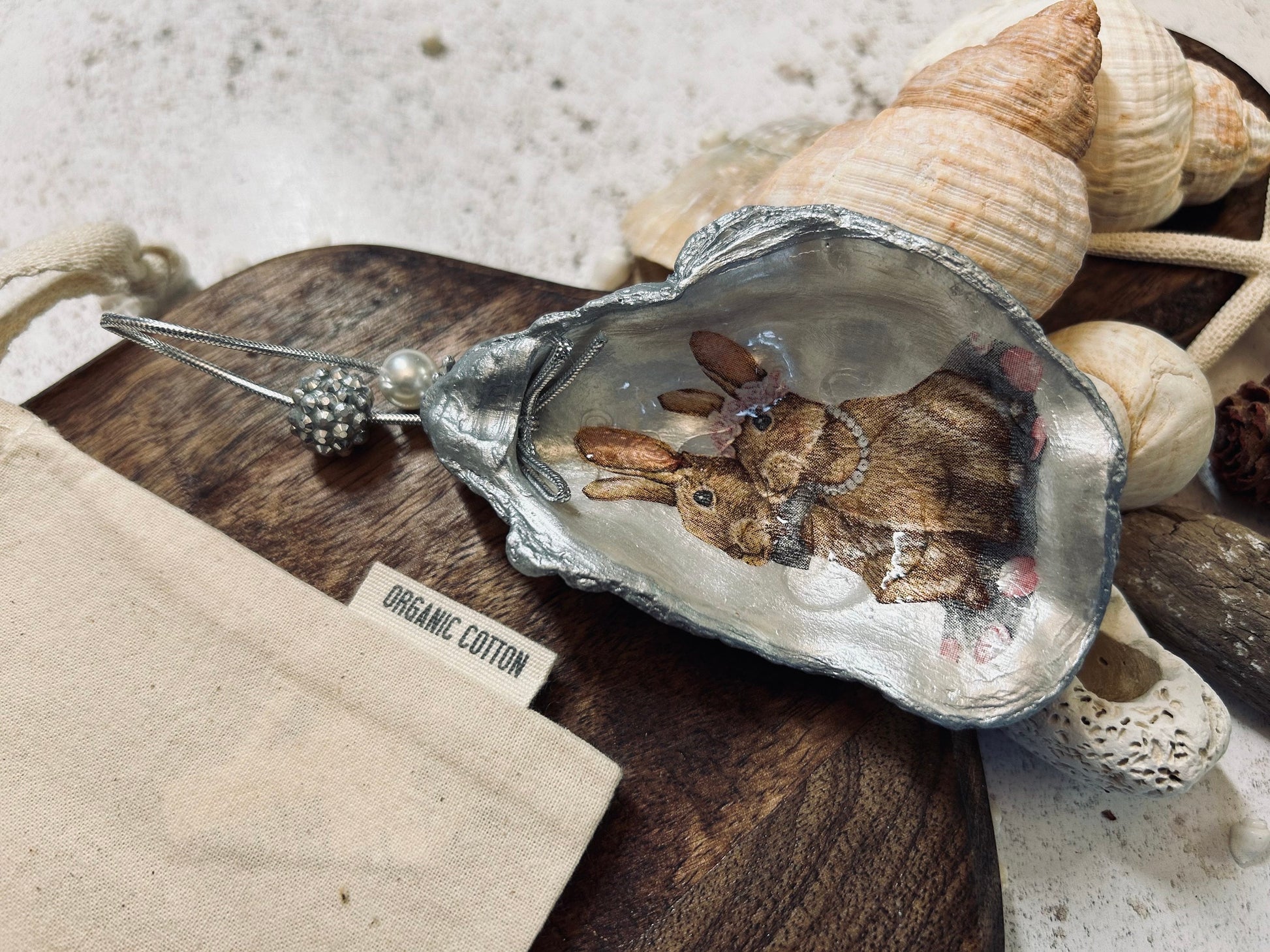 Brown Bunnies hanging decoration. Natural oyster shell rabbit gift for a nature lover. Easter spring table decor. Rabbit lovers gift.