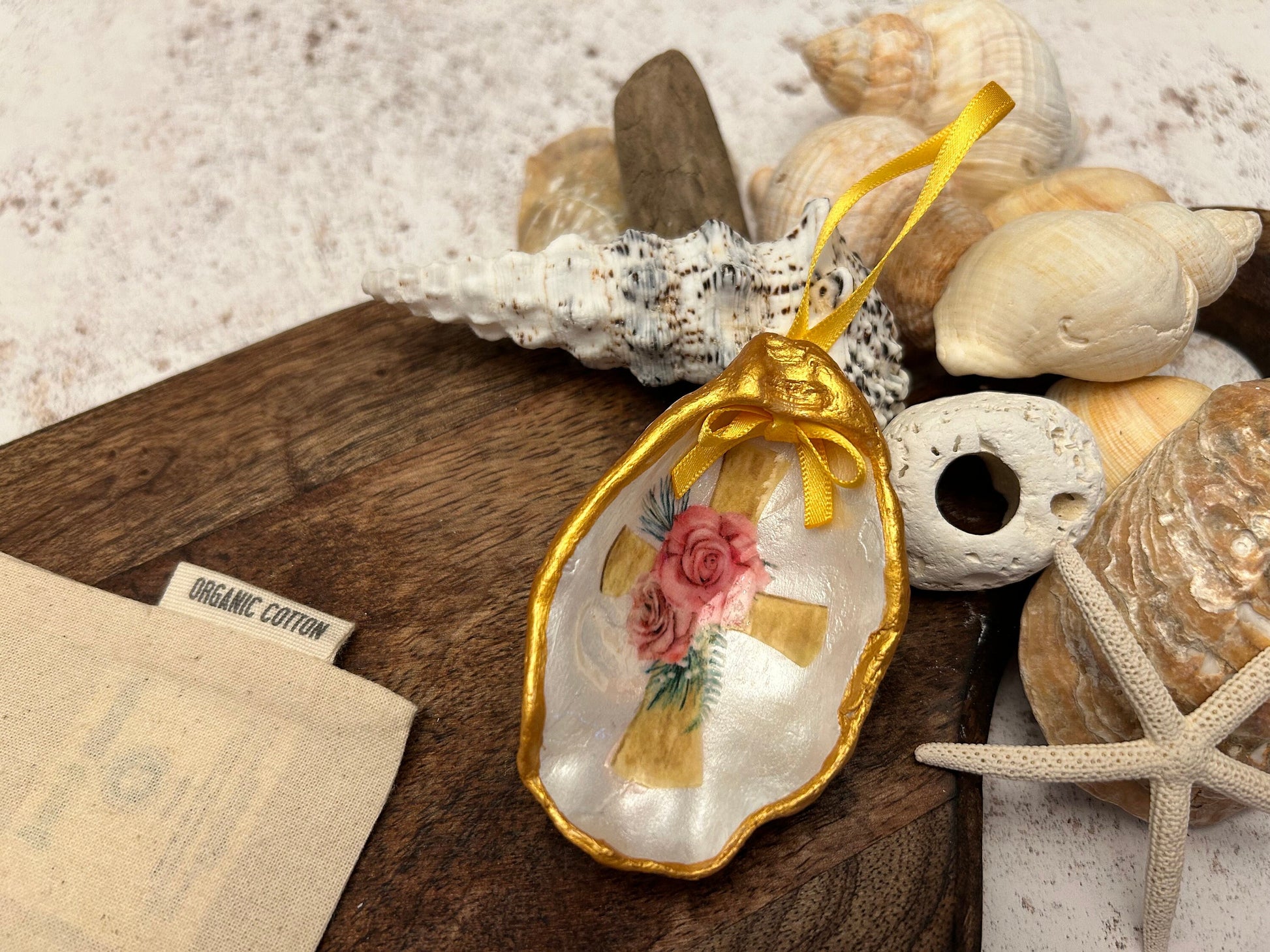 Pink Personalised Christening oyster shell nursery gift. Gold Cross and pink rose ornament. Baptism or Holy Communion ceremony gift.