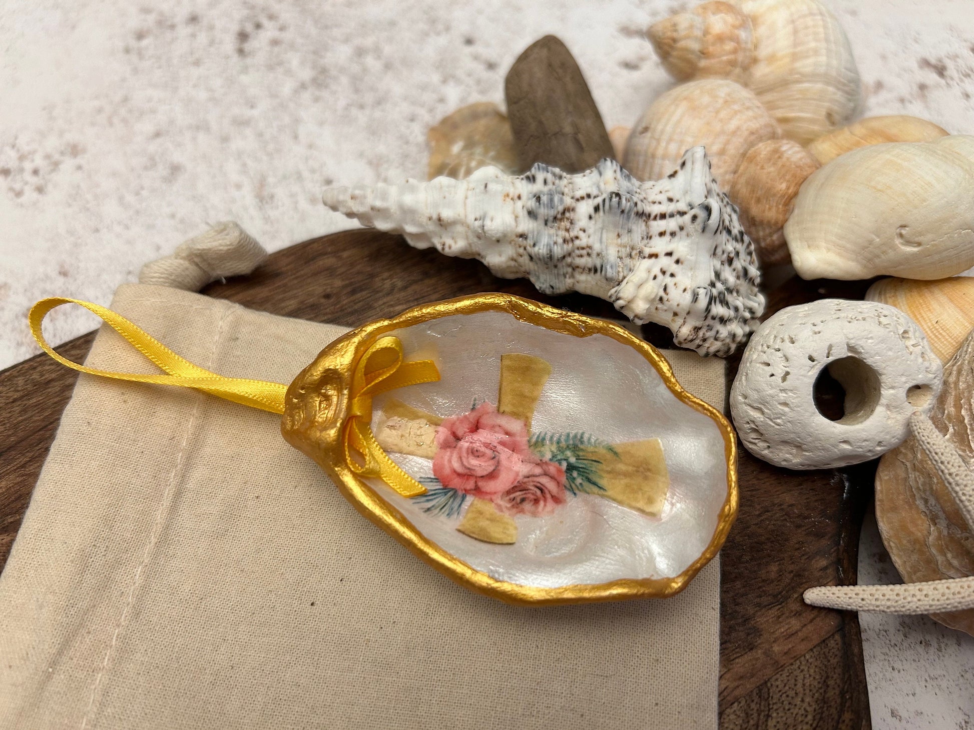 Pink Personalised Christening oyster shell nursery gift. Gold Cross and pink rose ornament. Baptism or Holy Communion ceremony gift.