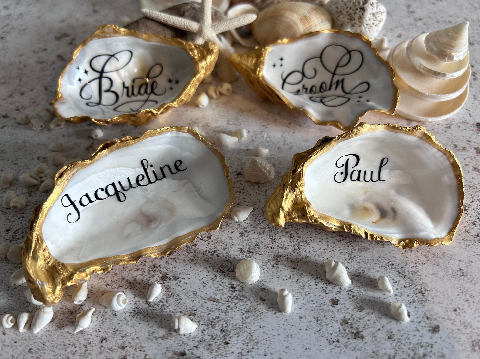 Personalised oyster shell place card. Wedding place names and favours. Natural inside with custom colours. Destination or beach wedding.