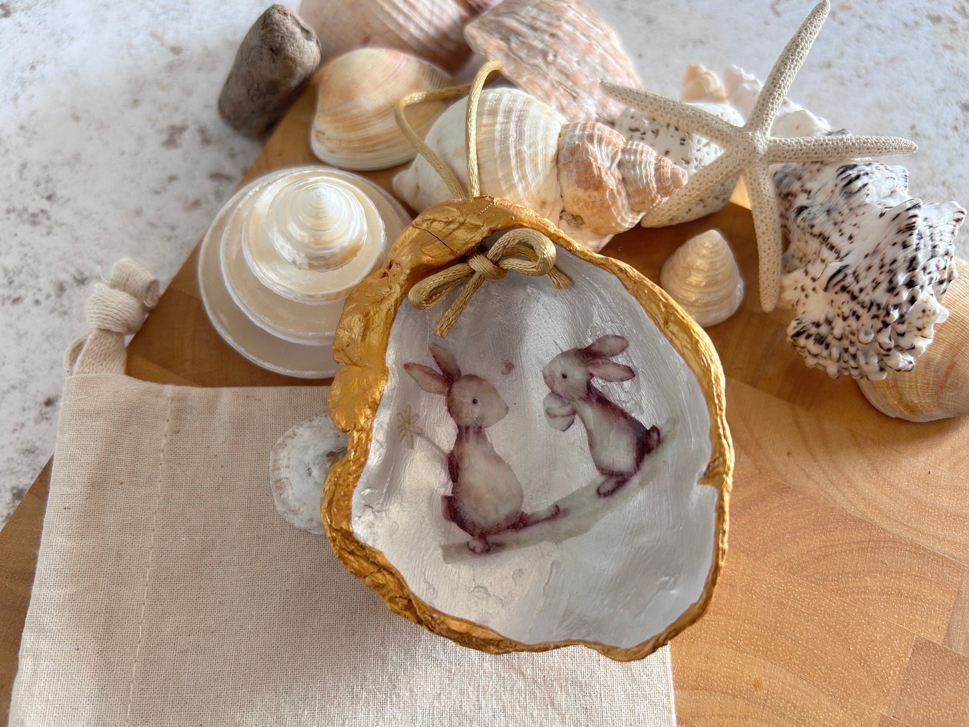 Cute rabbit shell hanging decoration. Brown bunnies Easter decoration. Spring home decor gift for a Rabbit lover. Bunny gift for her.