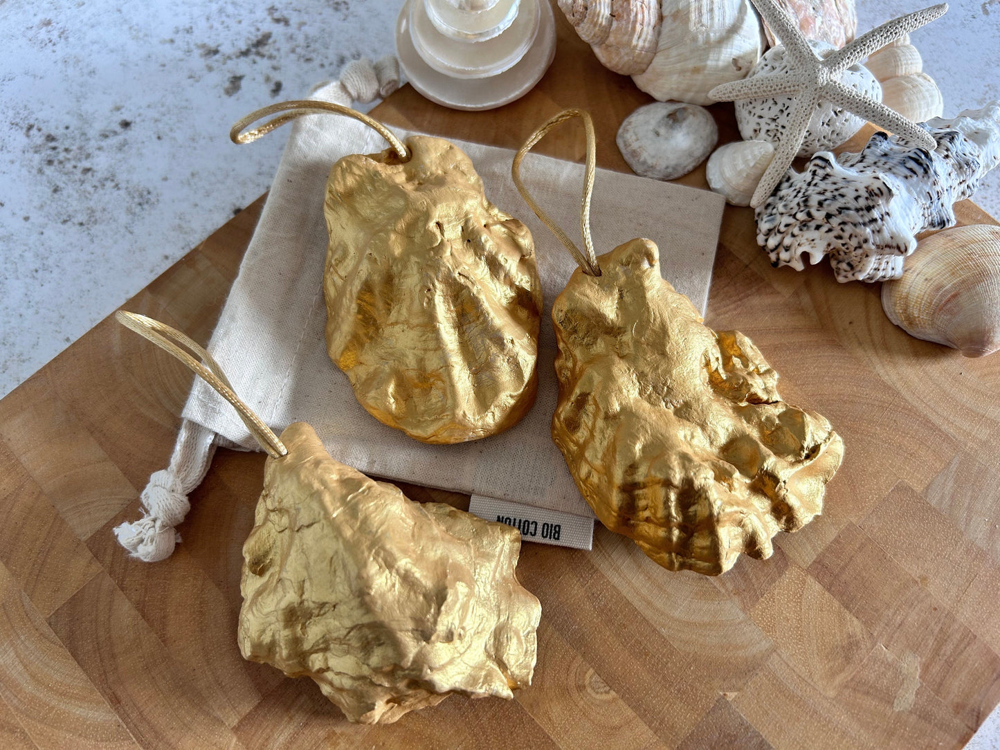 Easter Hare oyster shell hanging decoration. Brown bunny rabbit couple ornament.