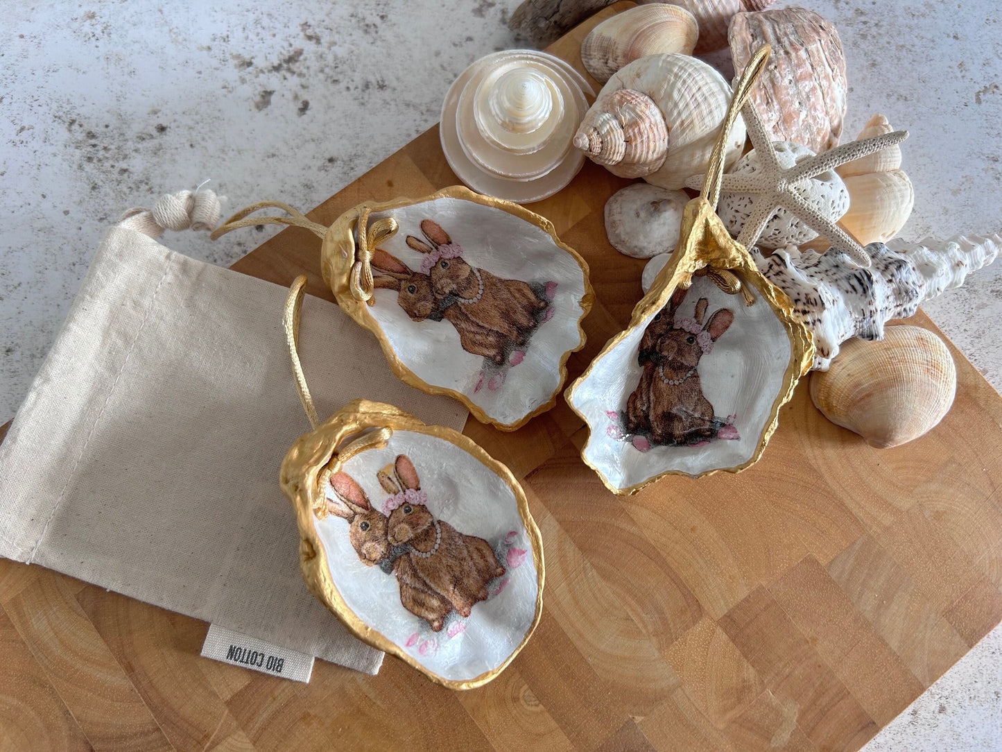 Easter Hare oyster shell hanging decoration. Brown bunny rabbit couple ornament.