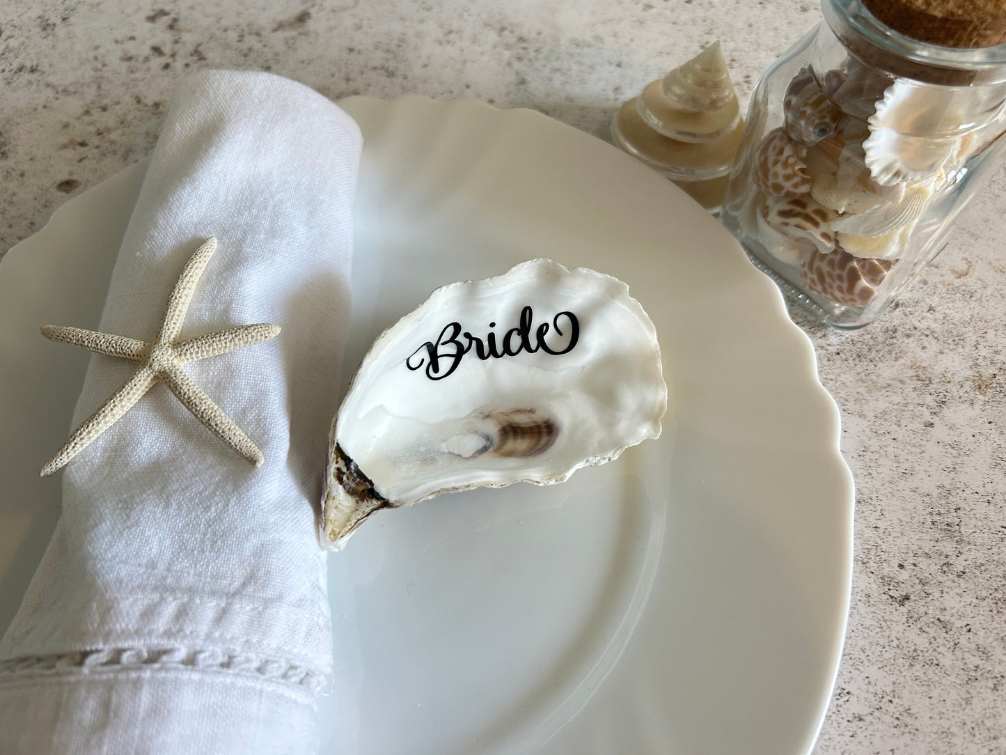 Oyster shell wedding place card. Natural shell name place for personalisation. Bridal party gift or destination weddings.