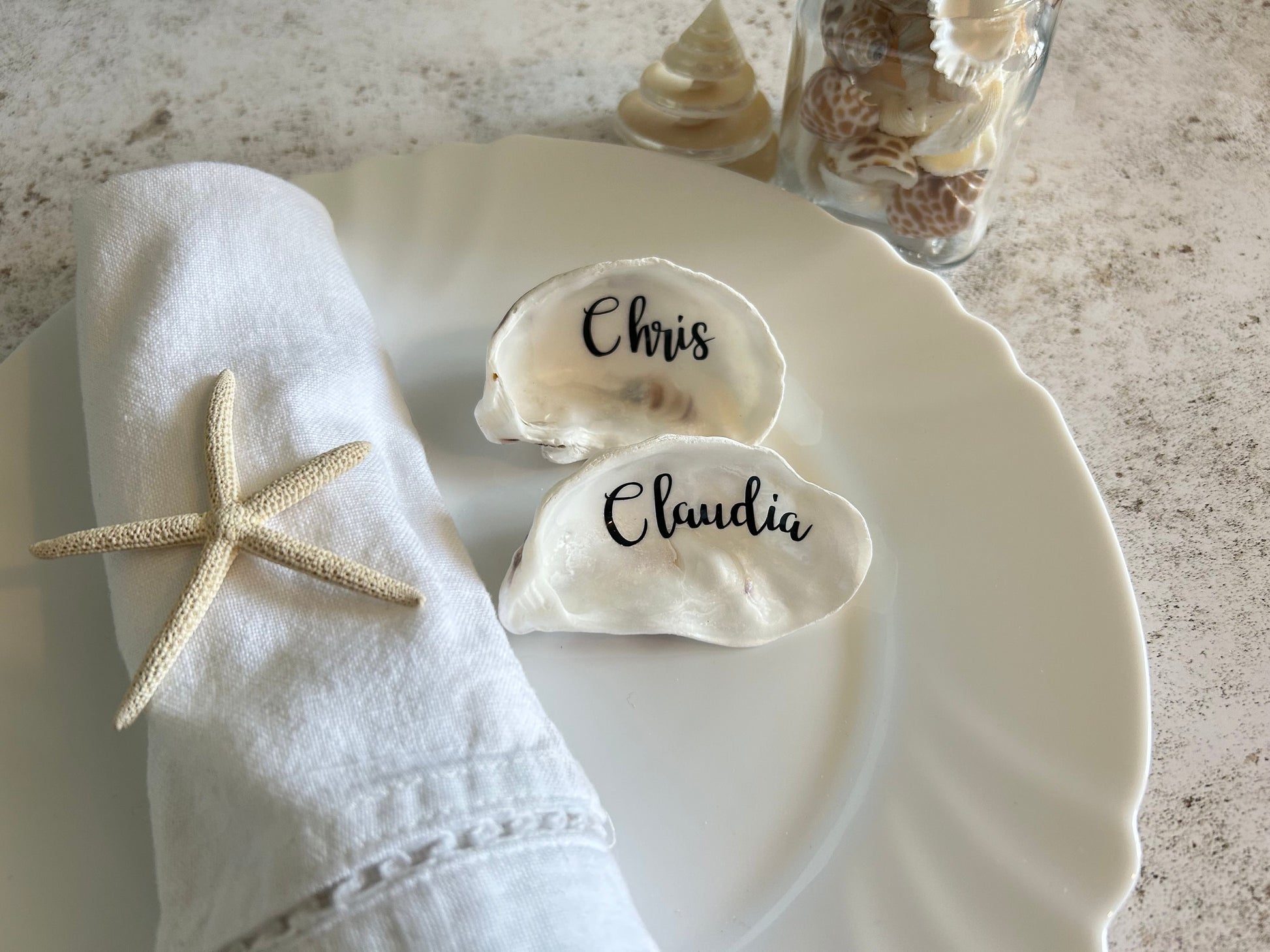 Oyster shell wedding place card. Natural shell name place for personalisation. Bridal party gift or destination weddings.