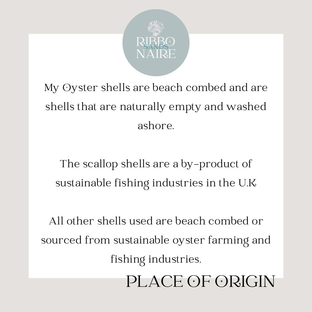 Copper oyster shell wedding favour and name place.