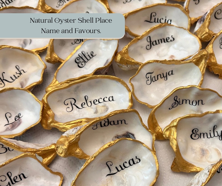 These natural oyster shells place names will add a touch of sophisticated luxury to your beach inspired wedding. Finished in gold on the rims and underside. The inside has been left natural.  with personalisation in a choice of colours.