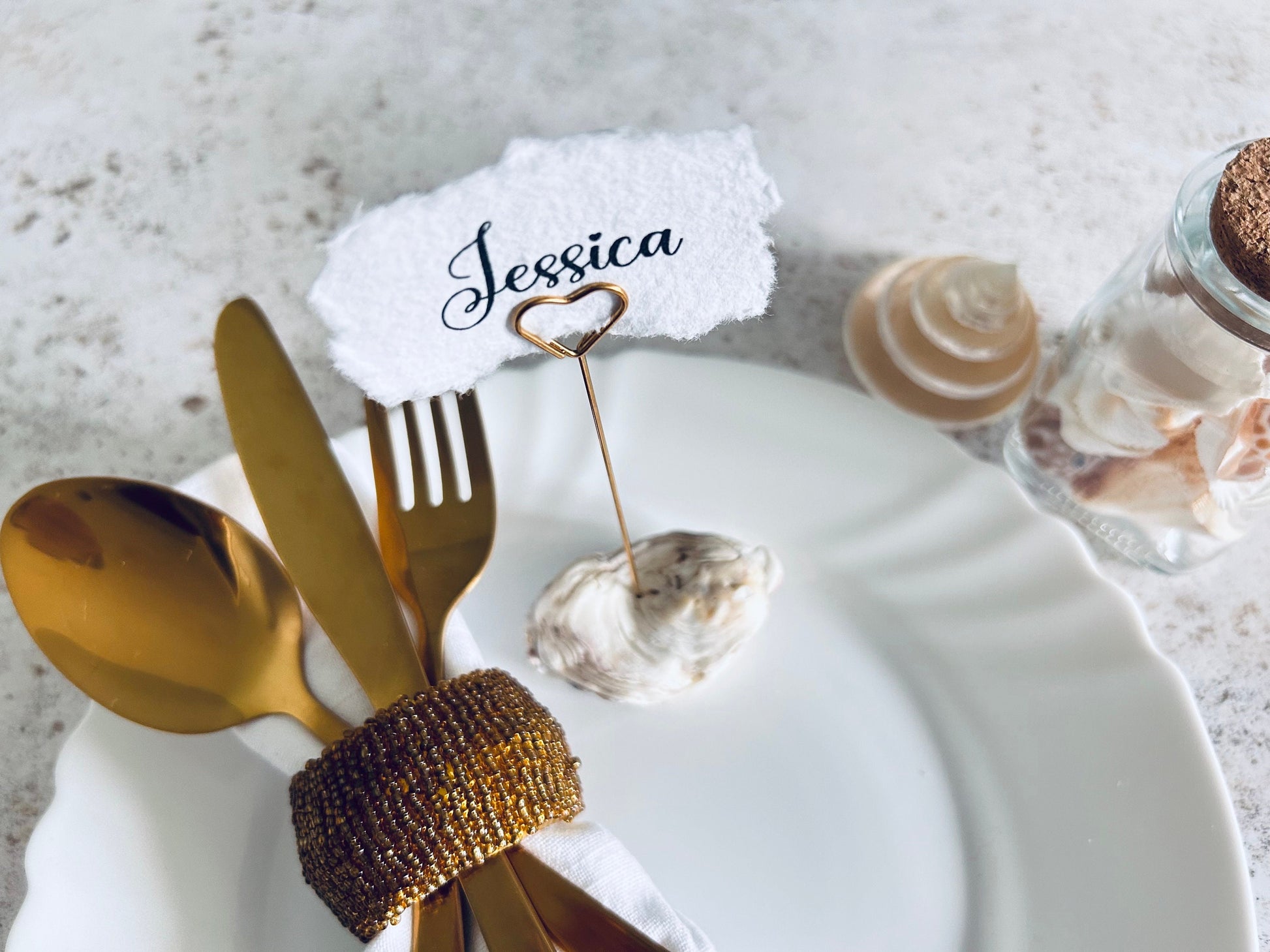 Personalised shell name cards. Seashell name card holder. Gold edged hand torn place names. Destination wedding shell guest name and favor.