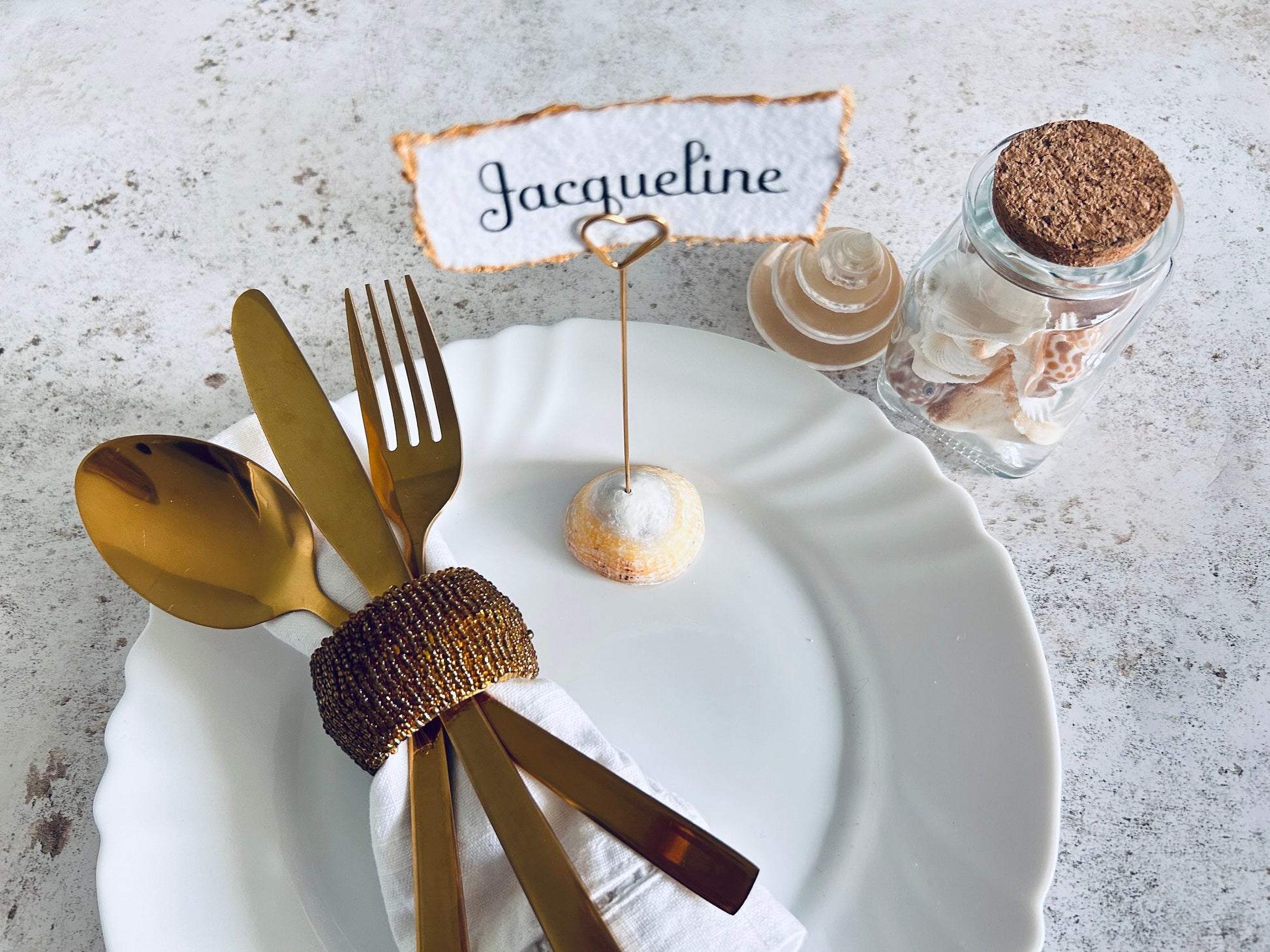 Personalised shell name cards. Seashell name card holder. Gold edged hand torn place names. Destination wedding shell guest name and favor.