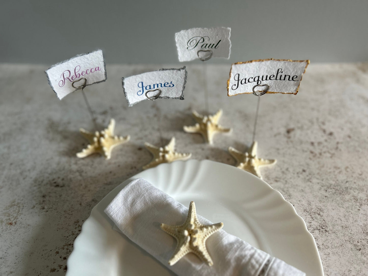 Starfish place card holder. Natural starfish name place holder. Beach wedding seeded name place card. Silver heart photo holder favour.