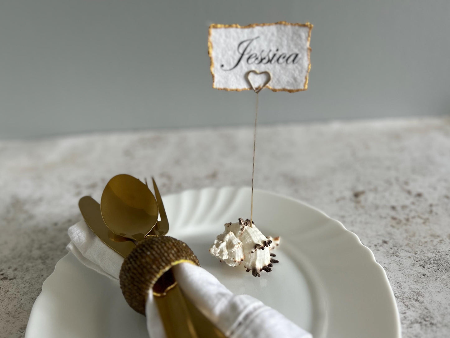 Personalised shell name cards. Seashell name card holder. Gold edged hand torn place names. Destination wedding shell guest name and favor.