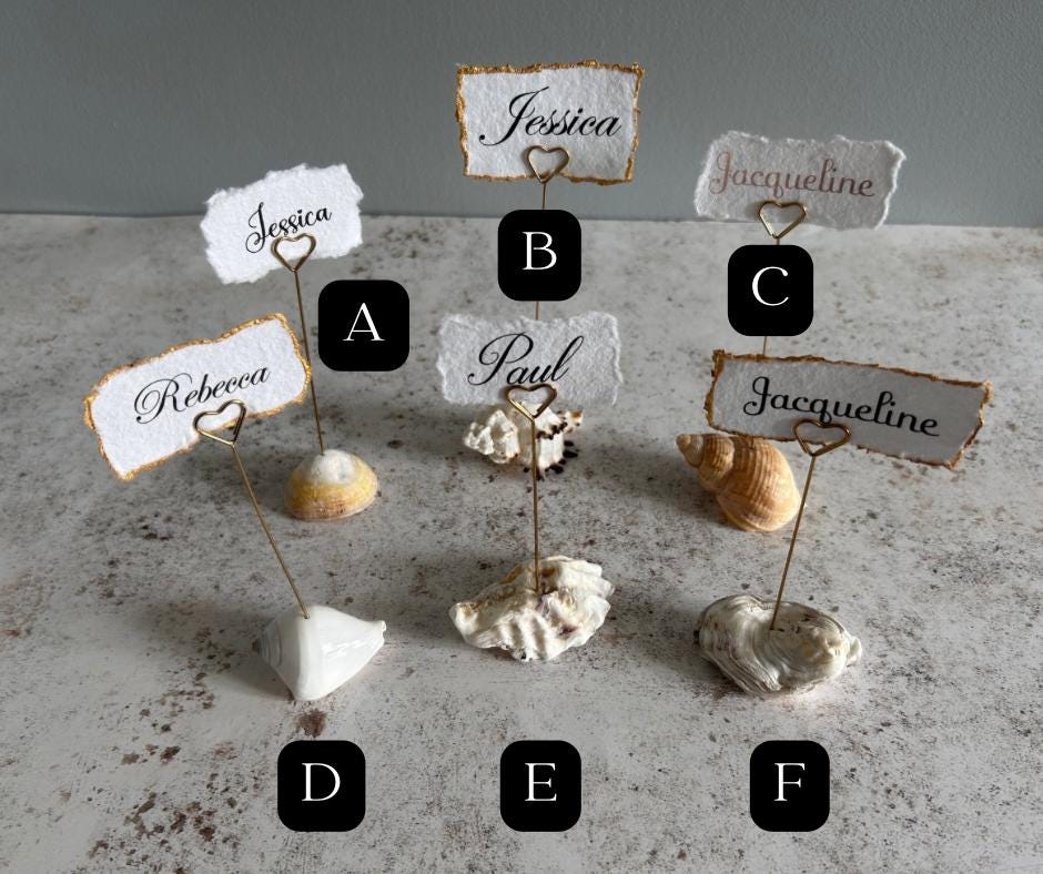 Personalised shell name cards. Seashell name card holder. Gold edged hand torn place names. Destination wedding shell guest name and favor.