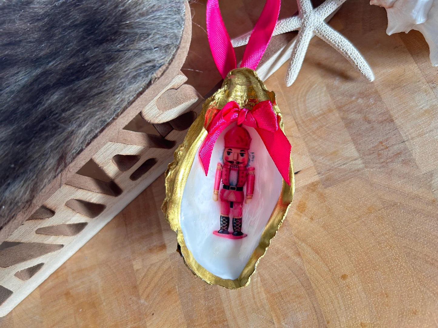 Pink Retro Nutcracker Oyster Shell Ornament. Gold and Cerise Handcrafted Christmas Bauble.