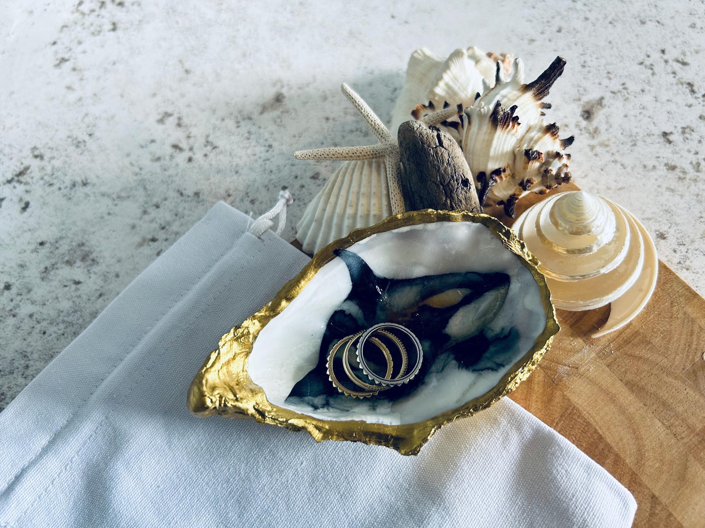 Killer whale oyster shell dish. Orca desk tidy gift for a sea life lover. Marine animal natural shell dish. Gold and Black sea shell dish.