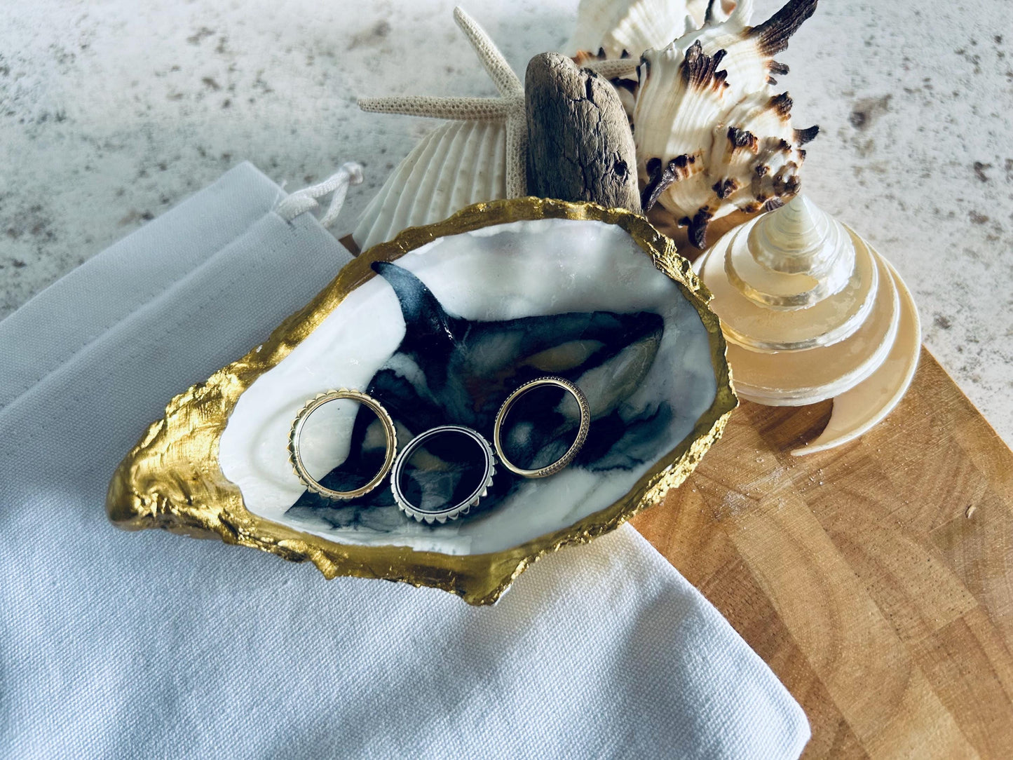 Killer whale oyster shell dish. Orca desk tidy gift for a sea life lover. Marine animal natural shell dish. Gold and Black sea shell dish.