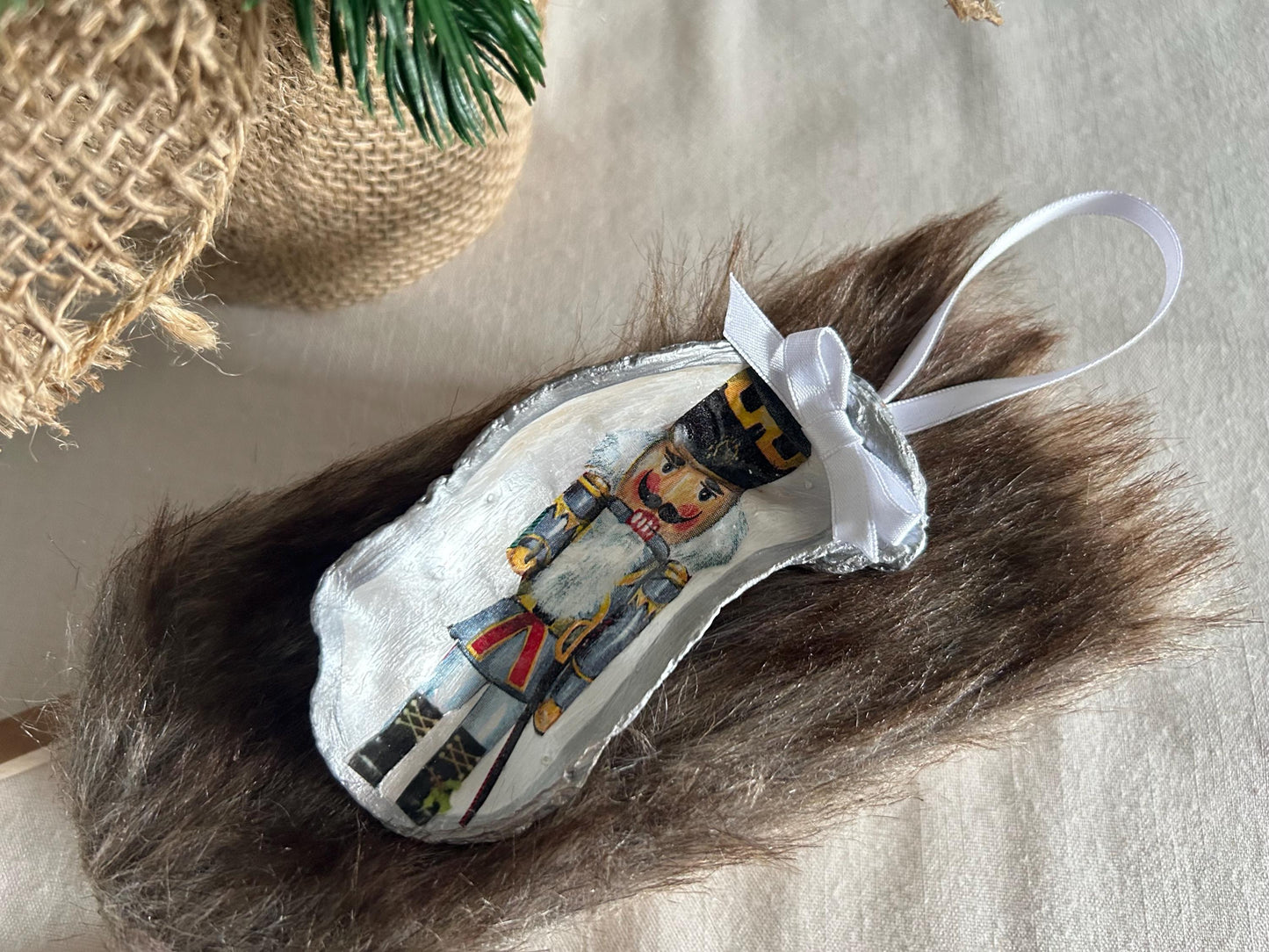 Nutcracker Christmas Tree Ornament. Silver Oyster Shell Holiday Decoration.