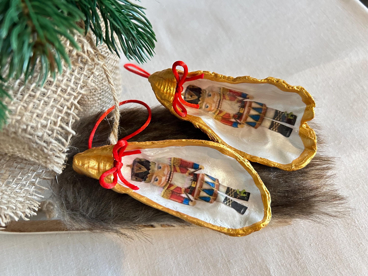 Nutcracker Oyster Shell Hanging Bauble. Festive Gold Christmas Soldier Tree Decoration.