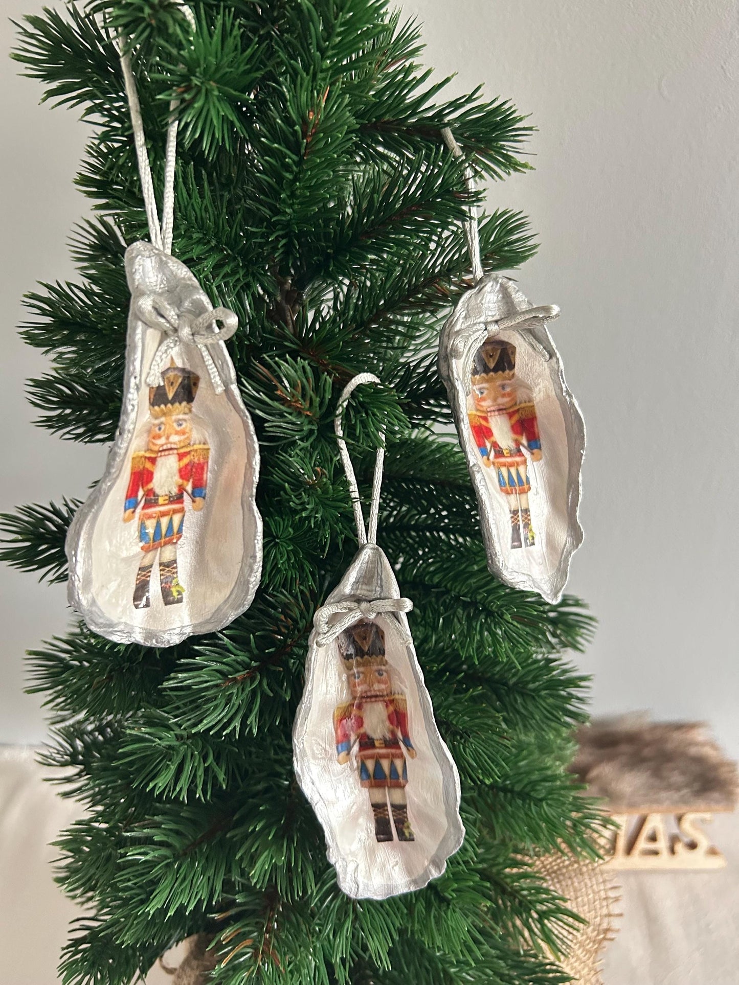 Silver Nutcracker Ornament. Coastal Holiday Home Decoration. Oyster Shell Bauble.