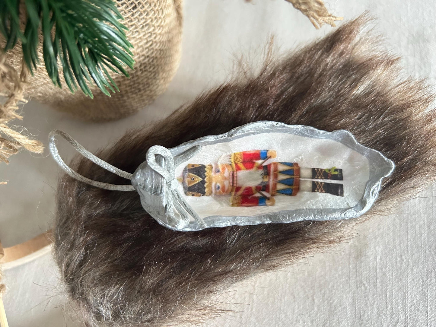 Silver Nutcracker Ornament. Coastal Holiday Home Decoration. Oyster Shell Bauble.