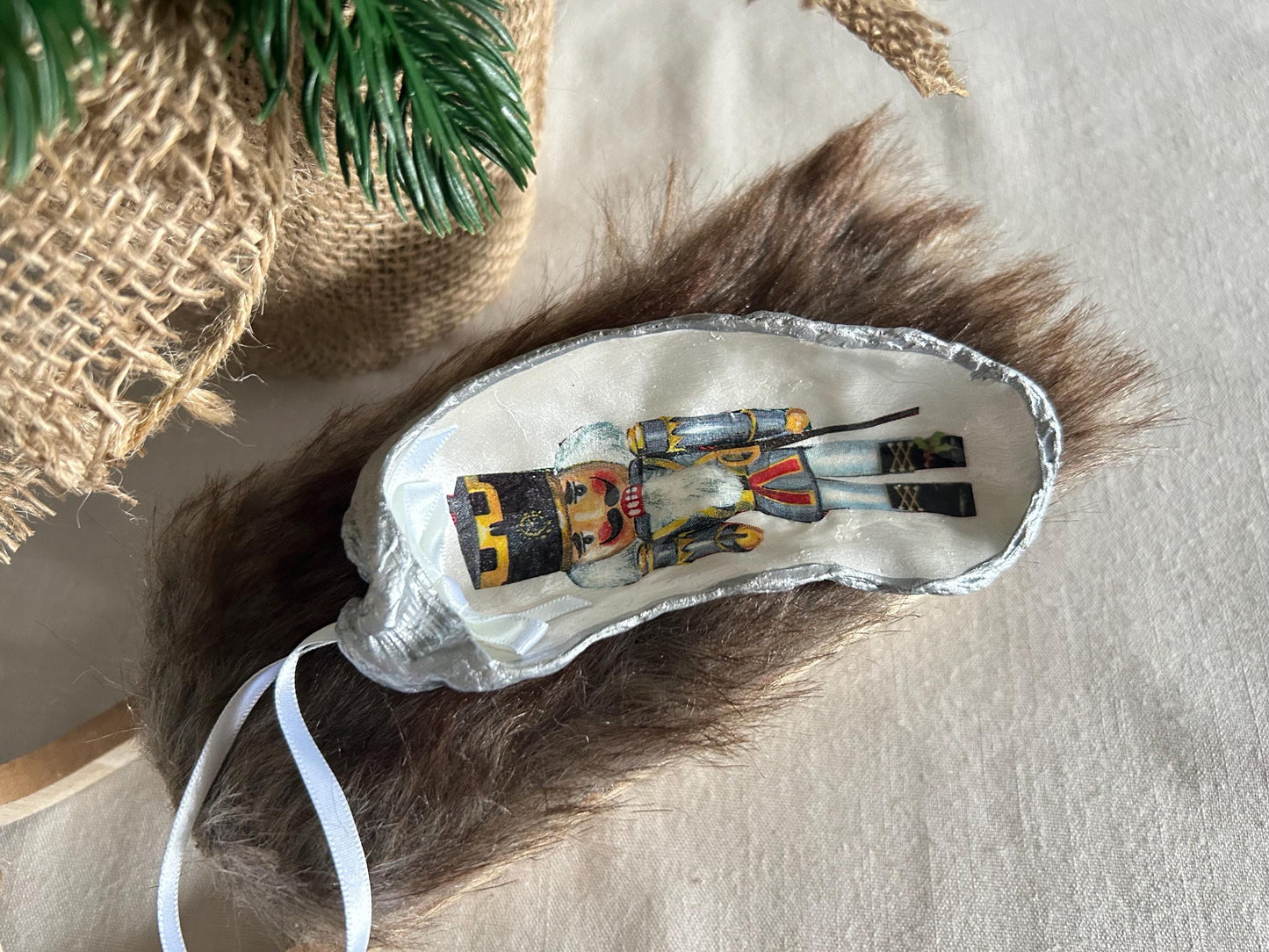 Nutcracker Christmas Tree Ornament. Silver Oyster Shell Holiday Decoration.