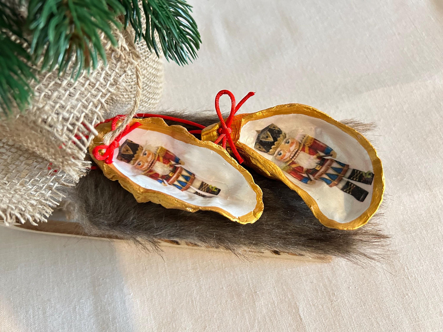 Nutcracker Oyster Shell Hanging Bauble. Festive Gold Christmas Soldier Tree Decoration.
