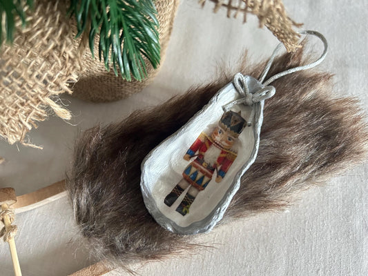 Silver Nutcracker Ornament. Coastal Holiday Home Decoration. Oyster Shell Bauble.