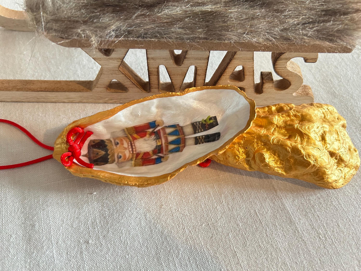 Personalised Nutcracker Oyster Shell Hanging Bauble. Festive Gold Christmas Soldier Tree Decoration.