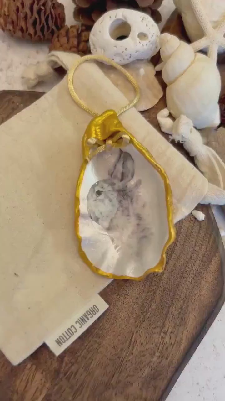 Hare portrait oyster shell in rich gold. Easter gift for hare lovers. Black and gold hare hanging ornament. Wildlife animal gift.