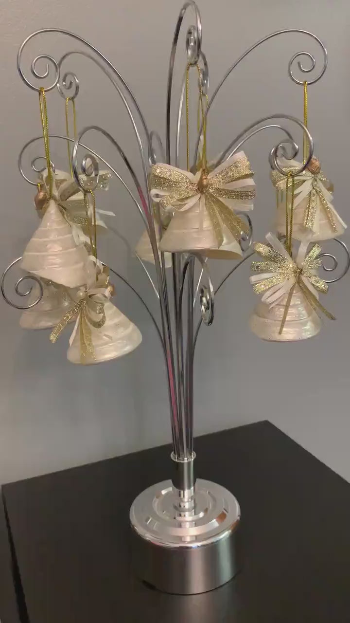 Pearlescent shell hanging decoration. Natural  Trochus spiral shell bauble. Mother of Pearl and gold glitter door decor. Fisherman aesthetic