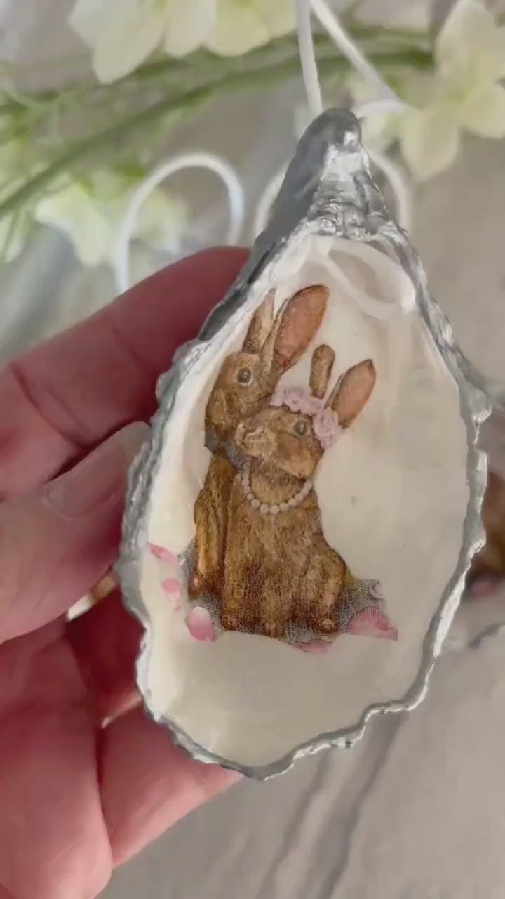 Hare hanging decoration. Brown rabbit couple silver oyster shell ornament. Easter hanging decor. Bride or wedding gift. Hare gift for her.